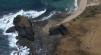 A tourist has been hospitalised after falling six metres down a cliff at the Mornington Peninsula National Park in Victoria.
