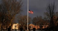 The U.S. flag flies at half-staff on the Main Green in honor of the victims of the campus shooting at Brown University, Wednesday, Dec. 17, 2025, in Providence, R.I. (AP Photo/Robert F. Bukaty)