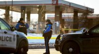 Omaha bystander flees gas station bathroom moments before armed man fires on officers