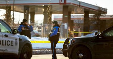 Omaha bystander flees gas station bathroom moments before armed man fires on officers