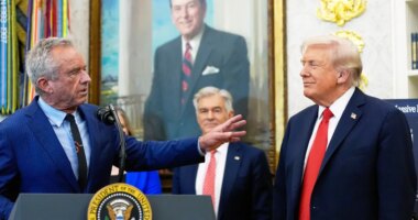 FILE - President Donald Trump listens as Health and Human Services Secretary Robert F. Kennedy Jr., speaks in the Oval Office of the White House, Oct. 16, 2025, in Washington. (AP Photo/Alex Brandon, File)