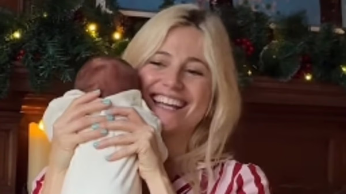 Pixie Lott gives a rare glimpse of her newborn son as she shares an adorable video of the family's preparations for baby's first Christmas