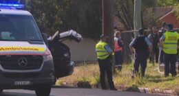 The trapped police officer has been freed from the vehicle.