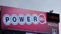 A billboard advertising the Powerball lottery is displayed, Monday, Dec. 22, 2025, in Portland, Ore. (AP Photo/Jenny Kane)