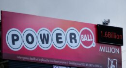 A billboard advertising the Powerball lottery is displayed, Monday, Dec. 22, 2025, in Portland, Ore. (AP Photo/Jenny Kane)