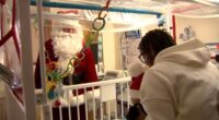 Santa Claus visits La Rabida Children's Hospital on Chicago's South Side on Christmas Day