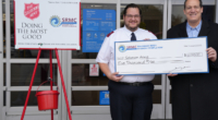 Savannah River Mission Completion donates $5,000 and rings bell for Salvation Army