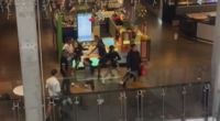 Shocking footage shows woman targeted in teen shopping centre brawl