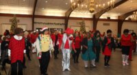 SmartSenior 2025 holiday party filled with dancing, celebrating health