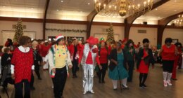 SmartSenior 2025 holiday party filled with dancing, celebrating health
