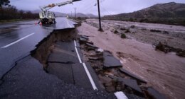 Part of California State Route 138 washes away from flooding Wednesday, Dec. 24, 2025, outside of Wrightwood, Calif. (AP Photo/Wally Skalij)