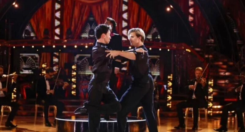 Strictly's Carlos Gu breaks down in tears on stage as Nikita Kuzmin rushes to comfort him