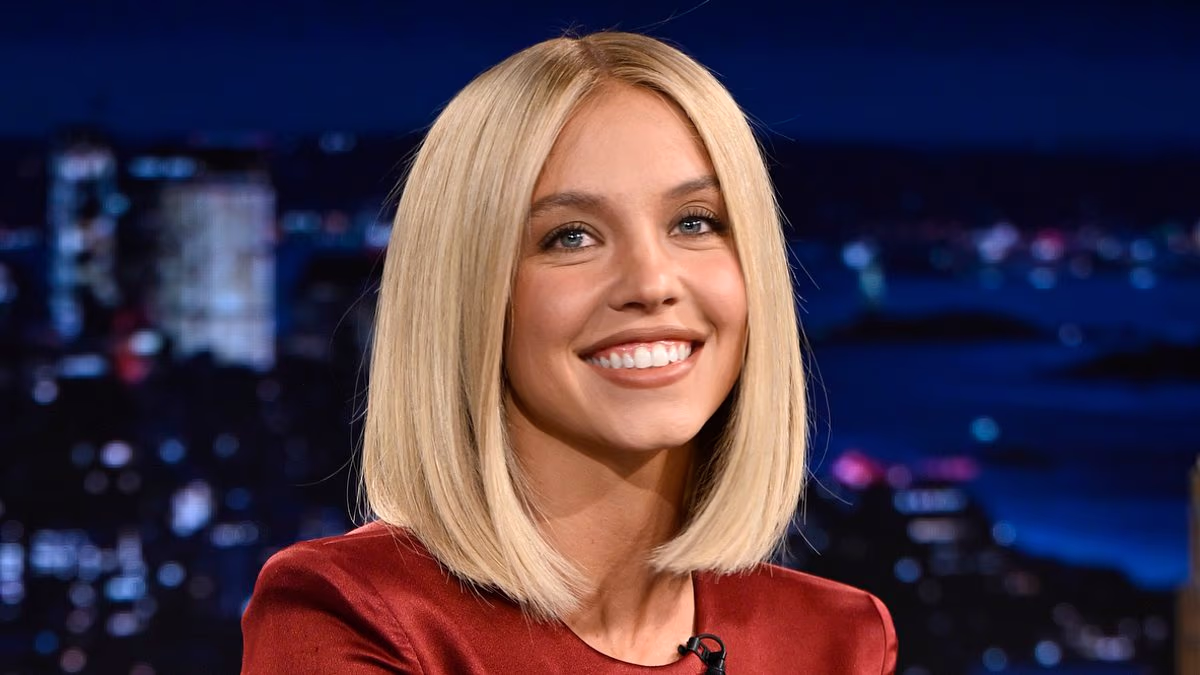 Sydney Sweeney flaunts ample assets in gown by Aussie designer