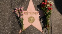 Flowers cover the Walk of Fame star for Rob Reiner Monday, Dec. 15, 2025, in the Hollywood section of Los Angeles. (AP Photo/Damian Dovarganes)