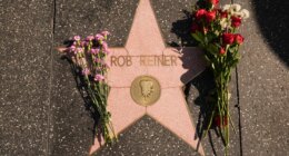 Flowers cover the Walk of Fame star for Rob Reiner Monday, Dec. 15, 2025, in the Hollywood section of Los Angeles. (AP Photo/Damian Dovarganes)