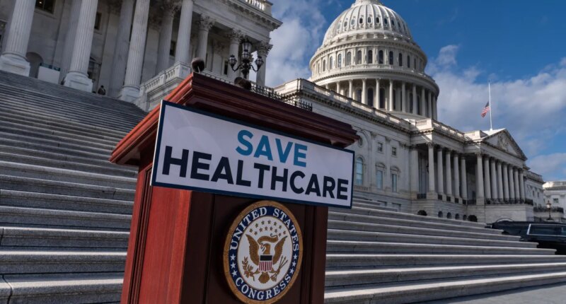 FILE - A lectern awaits the arrival of House Democrats to speak on the health care funding fight on the steps of the House at the Capitol in Washington, Nov. 12, 2025. (AP Photo/J. Scott Applewhite, File)