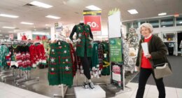 FILE - Shoppers browse through Kohl