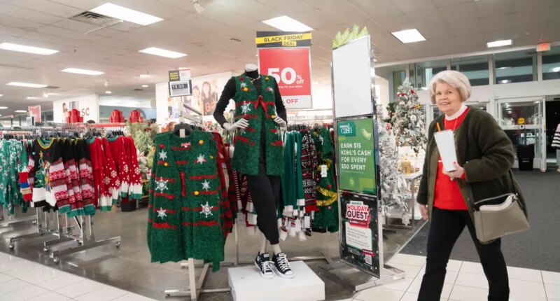 FILE - Shoppers browse through Kohl