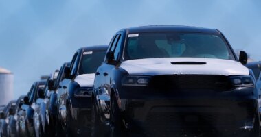 FILE - New vehicles are seen at an auto-processing facility at the Atlantic Terminal of the Port of Baltimore, March 27, 2025, in Baltimore. (AP Photo/Stephanie Scarbrough, File)