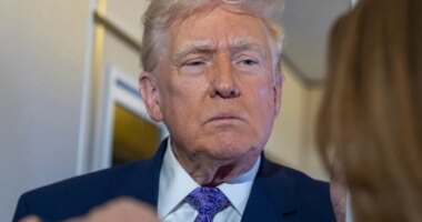 President Donald Trump speaks with reporters while in flight on Air Force One from his Mar-a-Lago estate in Palm Beach, Fla., to Joint Base Andrews, Sunday, Nov. 30, 2025. (AP Photo/Alex Brandon)