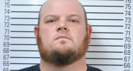 US man shooting gun in yard kills woman blocks away, police say