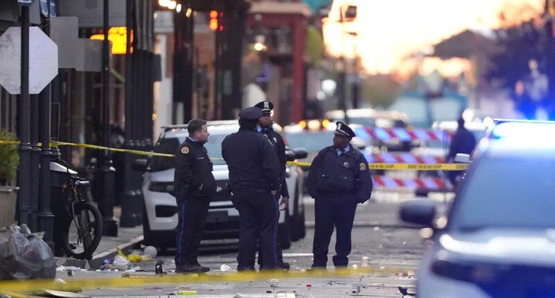 FILE - Emergency services attend to the scene on Bourbon Street after a vehicle drove into a crowd on New Orleans