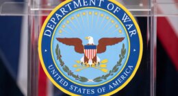 The seal is seen on a podium at the Pentagon, Wednesday, Dec. 10, 2025, in Washington, before Defense Secretary Pete Hegseth speaks. (AP Photo/Mark Schiefelbein)