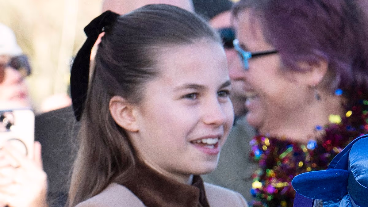 William beams with pride as he watches Charlotte greet well-wishers