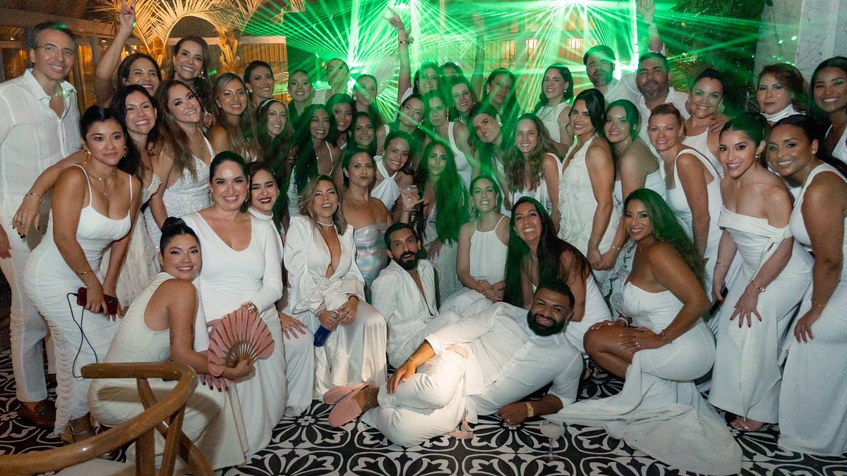 Woman marries her 70 closest friends in $250k 'sisterhood wedding'
