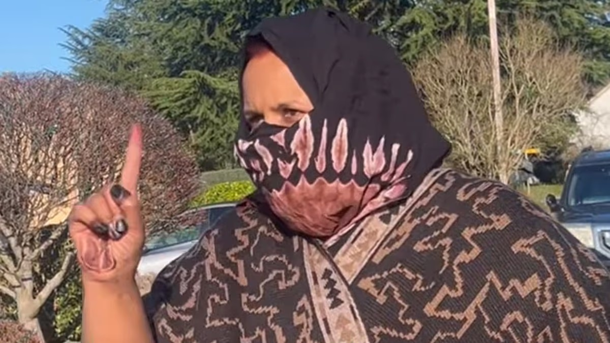 Woman wags her finger at journalist asking about daycare