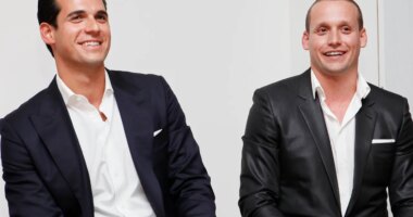 FILE - Oren and Tal Alexander speak at a panel at the Rockstars of Real Estate Event, Sept. 3, 2013 in New York. (Photo by Amy Sussman/Invision for DETAILS Magazine/AP Images, File)