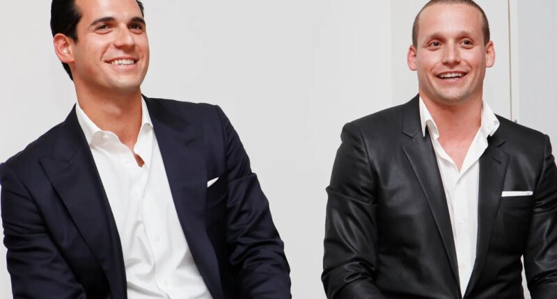 FILE - Oren and Tal Alexander speak at a panel at the Rockstars of Real Estate Event, Sept. 3, 2013 in New York. (Photo by Amy Sussman/Invision for DETAILS Magazine/AP Images, File)