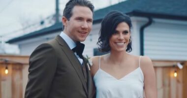 Spencer and Monique Tepe pose on their wedding day.