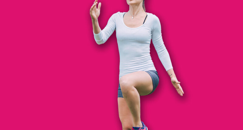 Athletic woman is training at an outdoor gym