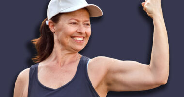 Female physical education teacher showing off her biceps and muscles, healthy lifestyle, body care