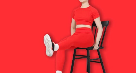 Beautiful woman stretching on chair at home, space for text