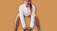 Woman before kettlebell swing cross fit exercise