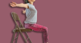 Full length shot of energetic mature woman making exercising and practicing restorative yoga on mat and chair at home because of social distancing, wearing sports clothes.