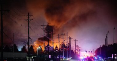 FILE - Plumes of smoke rise from the area of a UPS cargo plane crash at Louisville Muhammad Ali International Airport, on Tuesday, Nov. 4, 2025, in Louisville, Ky. (AP Photo/Jon Cherry, File)