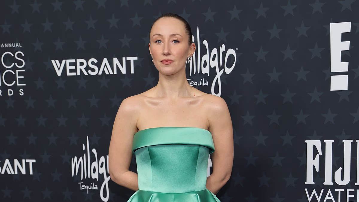 Adolescence star Erin Doherty looks glam in a satin turquoise dress as she and co-star Owen Cooper arrive at the Critics Choice awards with their hit show set to sweep the board