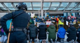 Anti-ICE agitators, including clergy, arrested at Minneapolis airport during protest in frigid weather
