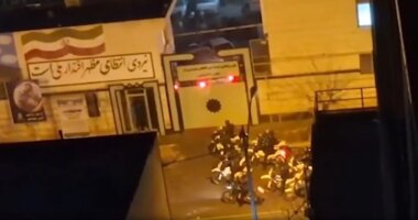 Armed Iranian protesters battle police in Tehran streets as Trump warns of forceful US response