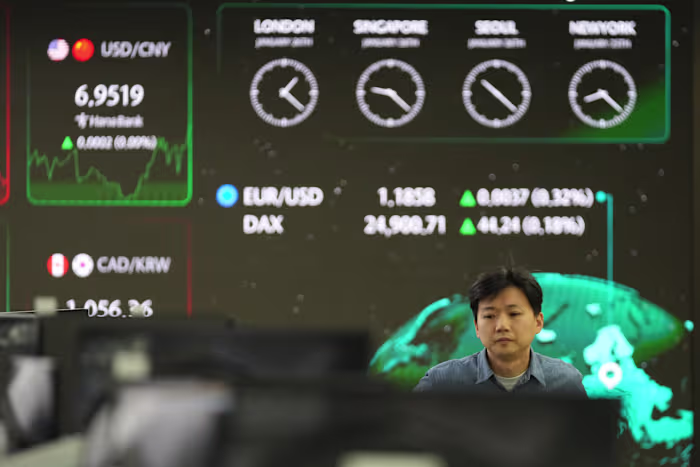 Asian shares mostly dip as the yen rises against the U.S. dollar