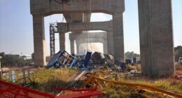 This photo released from State Railway of Thailand, shows a scene after a construction crane fell into a passenger train in Nakhon Ratchasima province, Thailand Wednesday, Jan. 14, 2026. (State Railway of Thailand via AP)