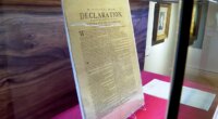 A copy of the Declaration of Independence, printed by Robert Luist Fowle in July 1776, sits on display at Christie