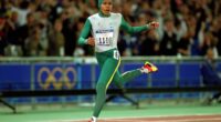 Cathy Freeman crossing the finish line and winning gold in the 400 metres at the Sydney 2000 Olympics.