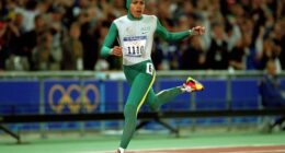 Cathy Freeman crossing the finish line and winning gold in the 400 metres at the Sydney 2000 Olympics.
