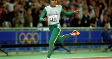 Cathy Freeman crossing the finish line and winning gold in the 400 metres at the Sydney 2000 Olympics.