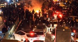 People gather during protest on January 8, 2026 in Tehran, Iran. Demonstrations have been ongoing since December, triggered by soaring inflation and the collapse of the rial, and have expanded into broader demands for political change.