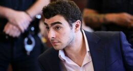 A Minnesota man was arrested and charged with impersonating an FBI agent after he tried to enter a federal jail and release suspected murderer Luigi Mangione